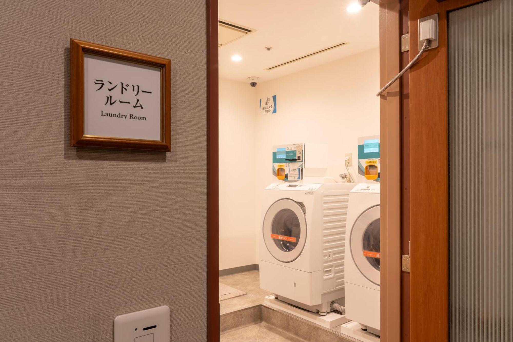 Hotel Associa Toyohashi Buitenkant foto Laundry room in a Japanese hotel